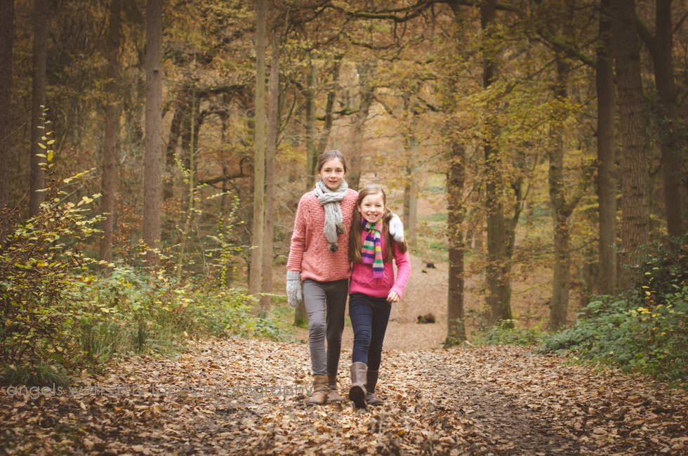 siblings walk in the woods captured by Outdoor Family Photographer Hertfordshire