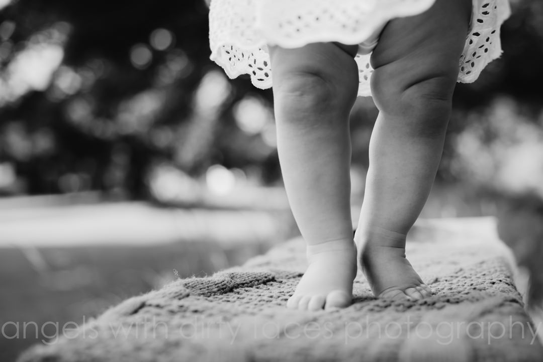 Baby Photographer Hertfordshire captures podgy knees and get on tip toes