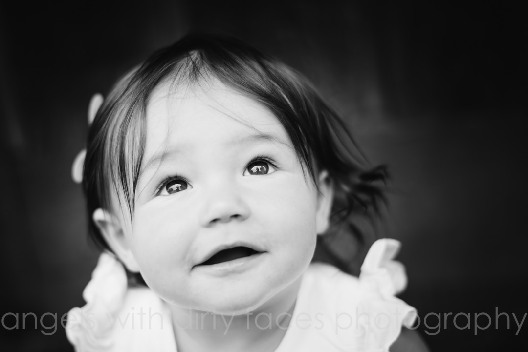 close up baby portrait in black and white photography