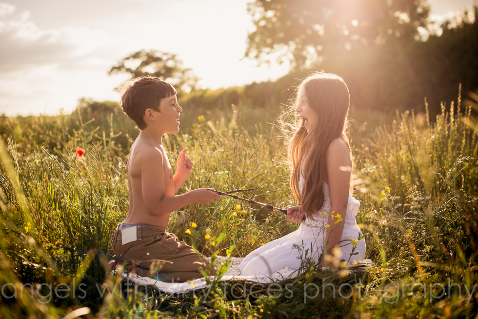 natural child photography in hertfordshire with harry potter wands and sunset