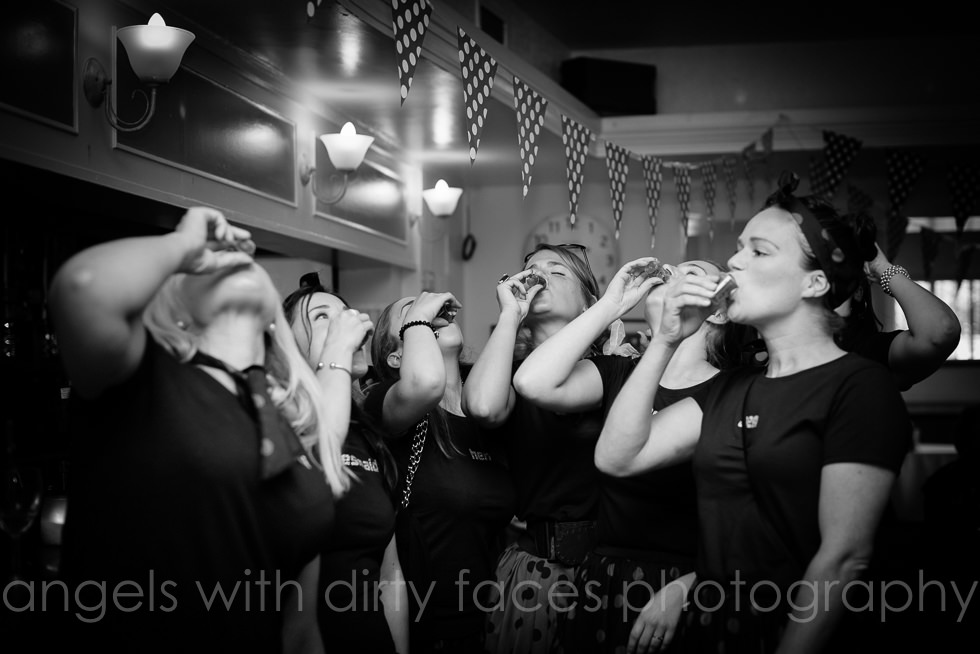 hen party photographer captures all the girls doing shots