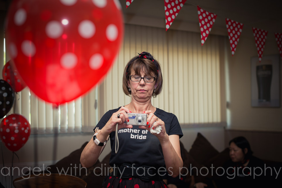mother of the bride doing her own hen party photography