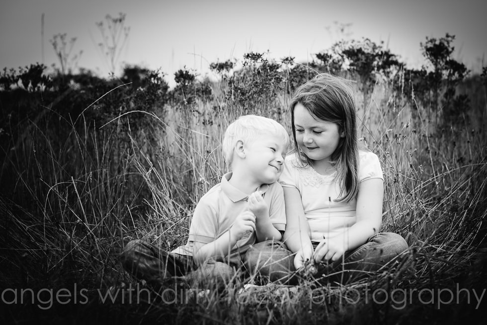 tender and natural family moment during their photoshoot in hertfordshire