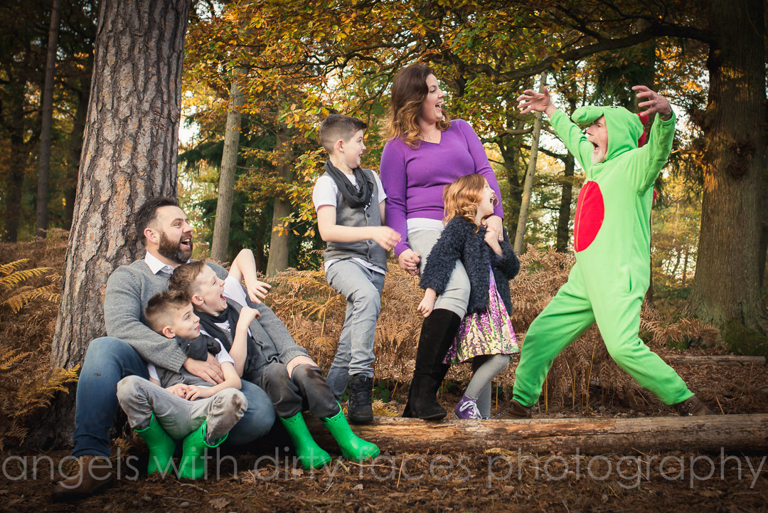 funny moment as grandad makes the kids jump during their Natural Family Photoshoot Hertfordshire Family Photographer