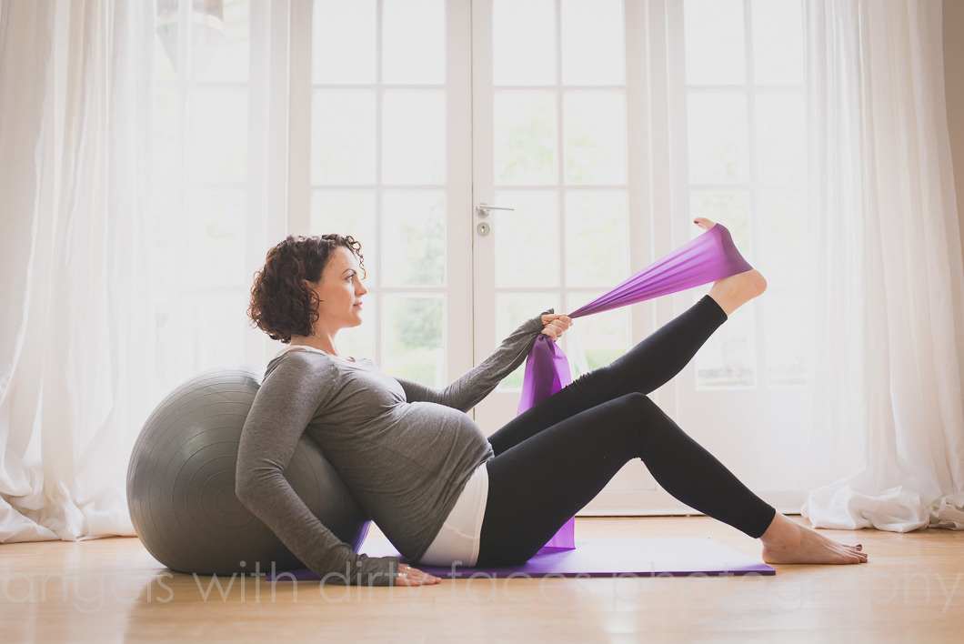Hertfordshire commercial photographer pilates inspired photo shoot showing band work with pilates ball