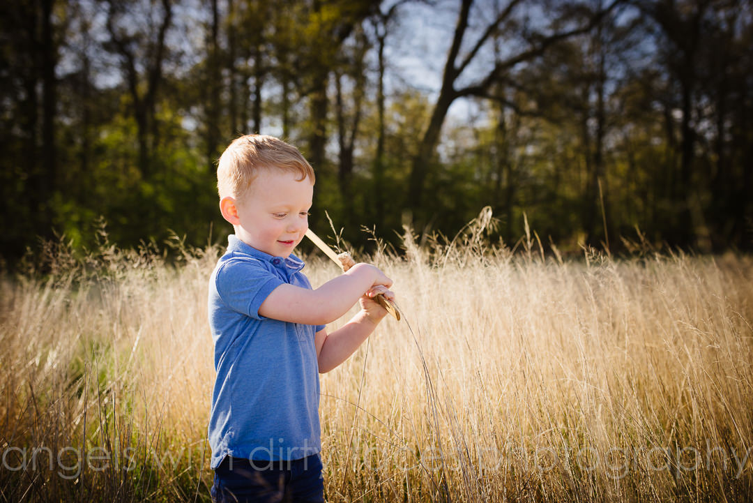 Family Photo Shoot with young boy waving a sword  captured by Hertfordshire Photographer