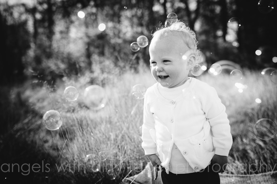 little girl and bubbles hertfordshire photographer
