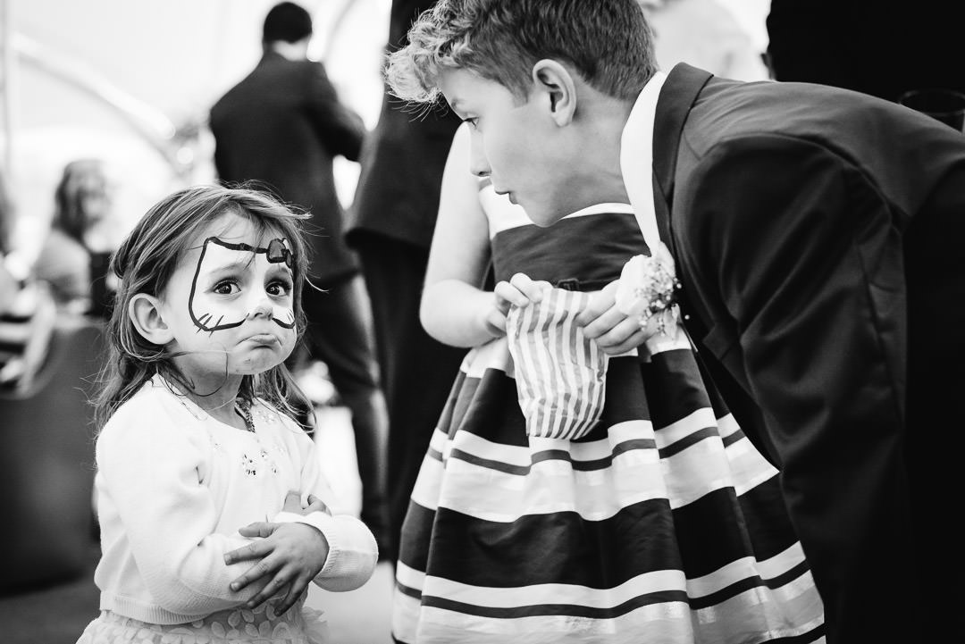 Child at Hertfordshire wedding dissolves into tears with face paint on her