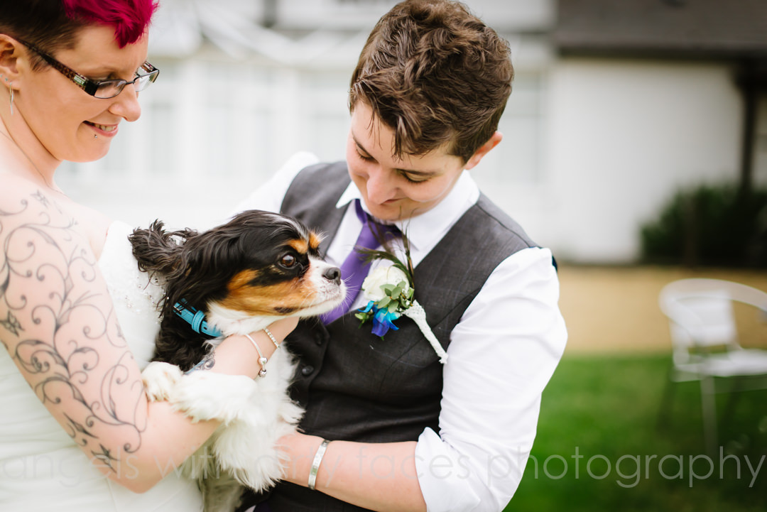 hertfordshire wedding photographer captures bride and groom with their dog