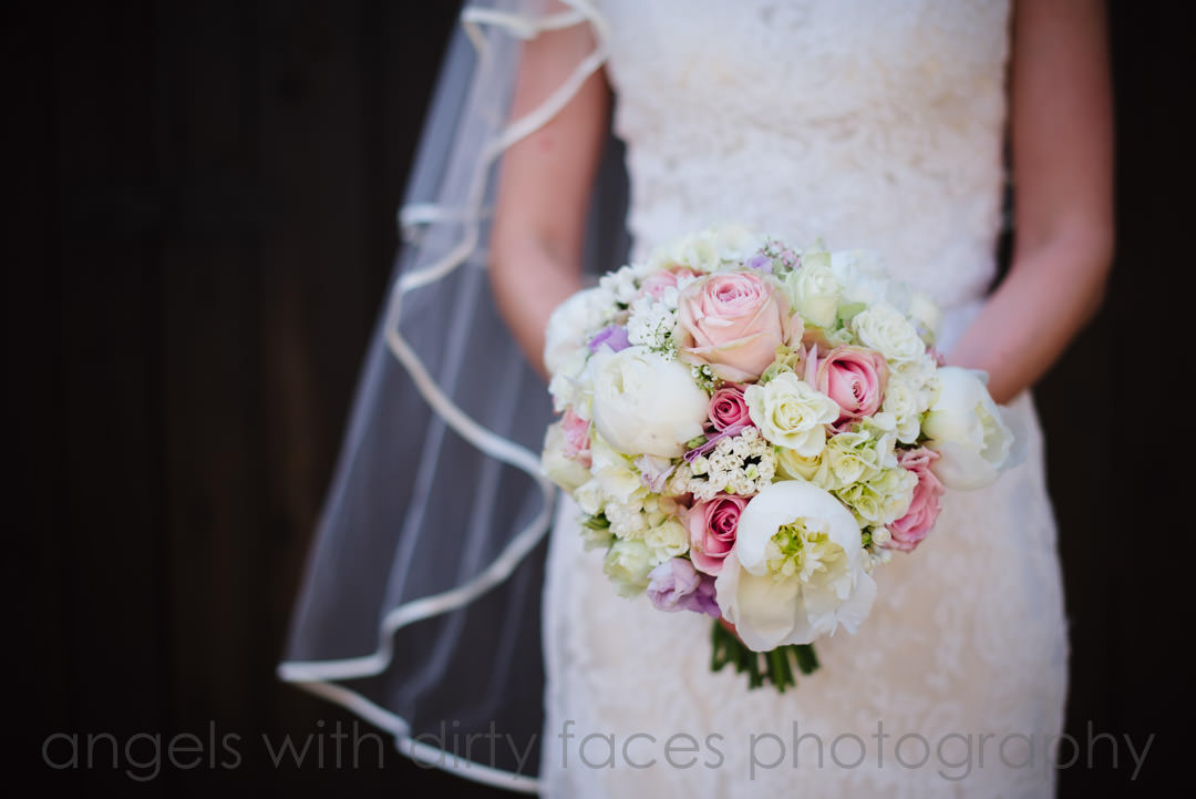 Tewin bury Farm Hotel wedding photography showing of photo of bridal bouquet