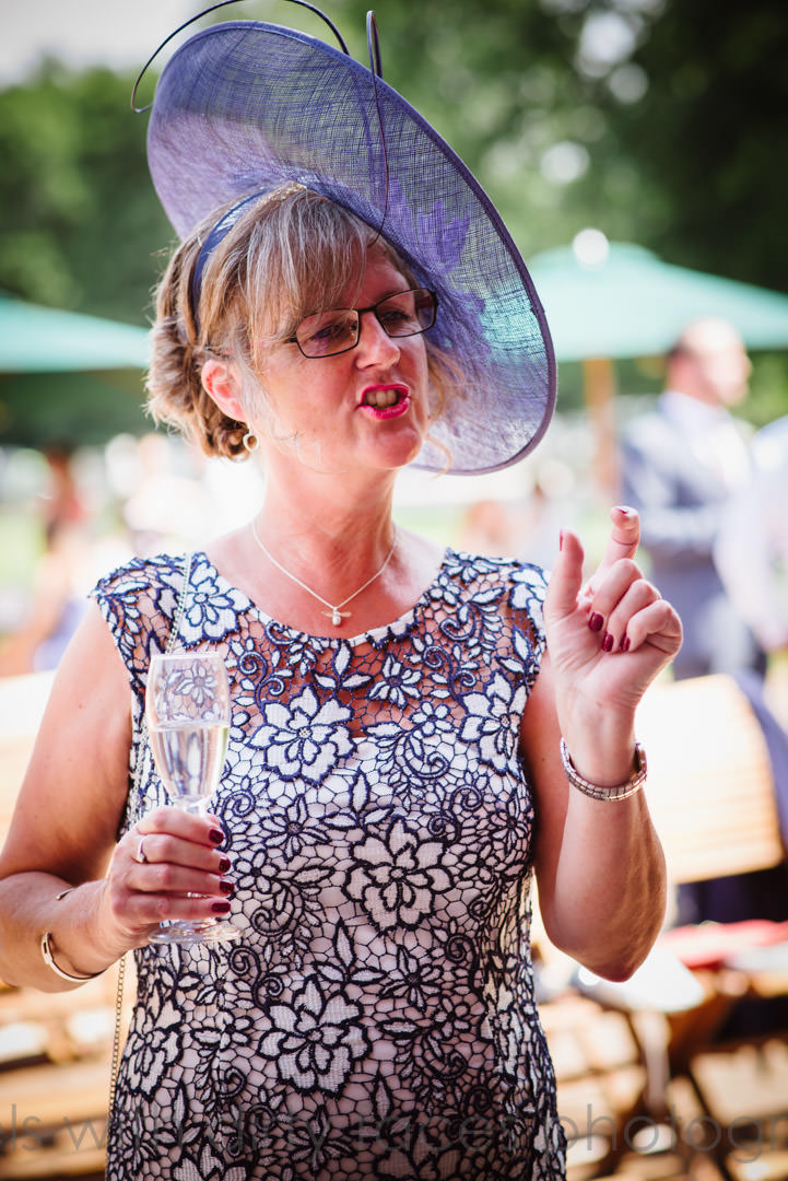 mother of the bride laughs at tewin bury farm wedding