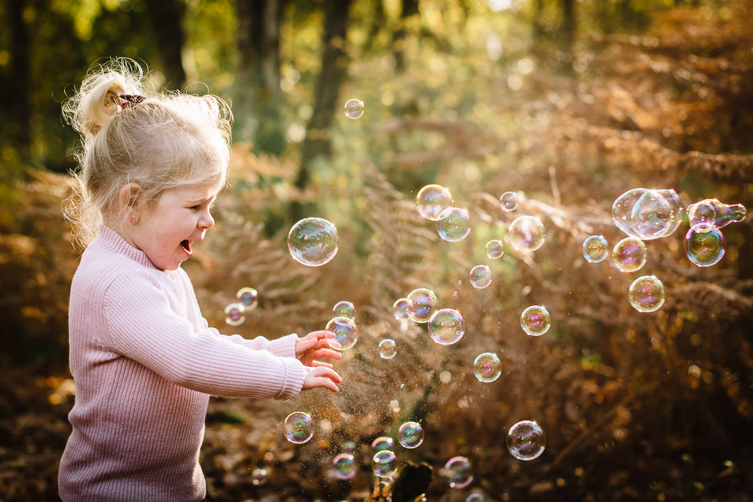 Autumn photo Shoot with bubbles in the woods