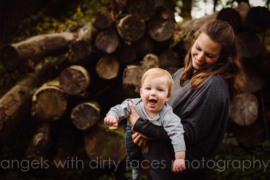 playing mother and child on their hertfordshire autumn photo shoot