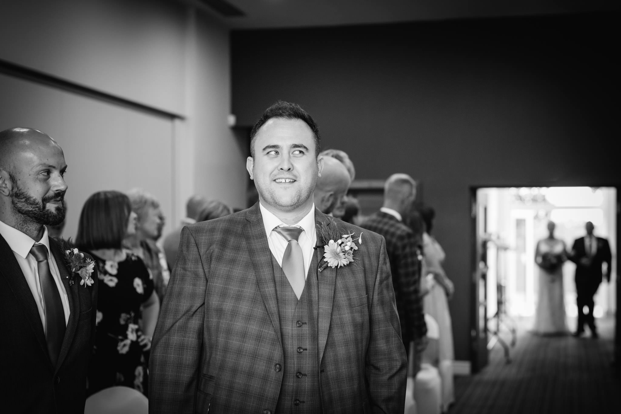 groom at the alter in alwickbury park wedding