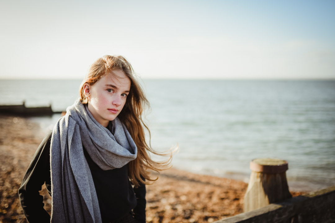 Hertfordshire family photographer captures her daughter on a windswept beach