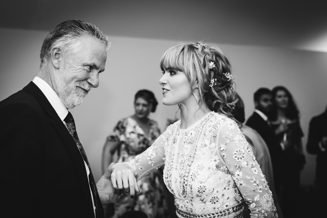 step father of the bride giving her a funny look