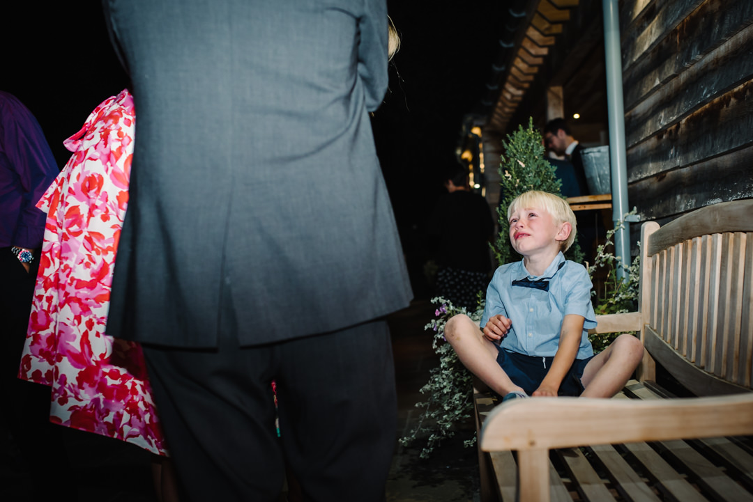 small boy crying at a wedding