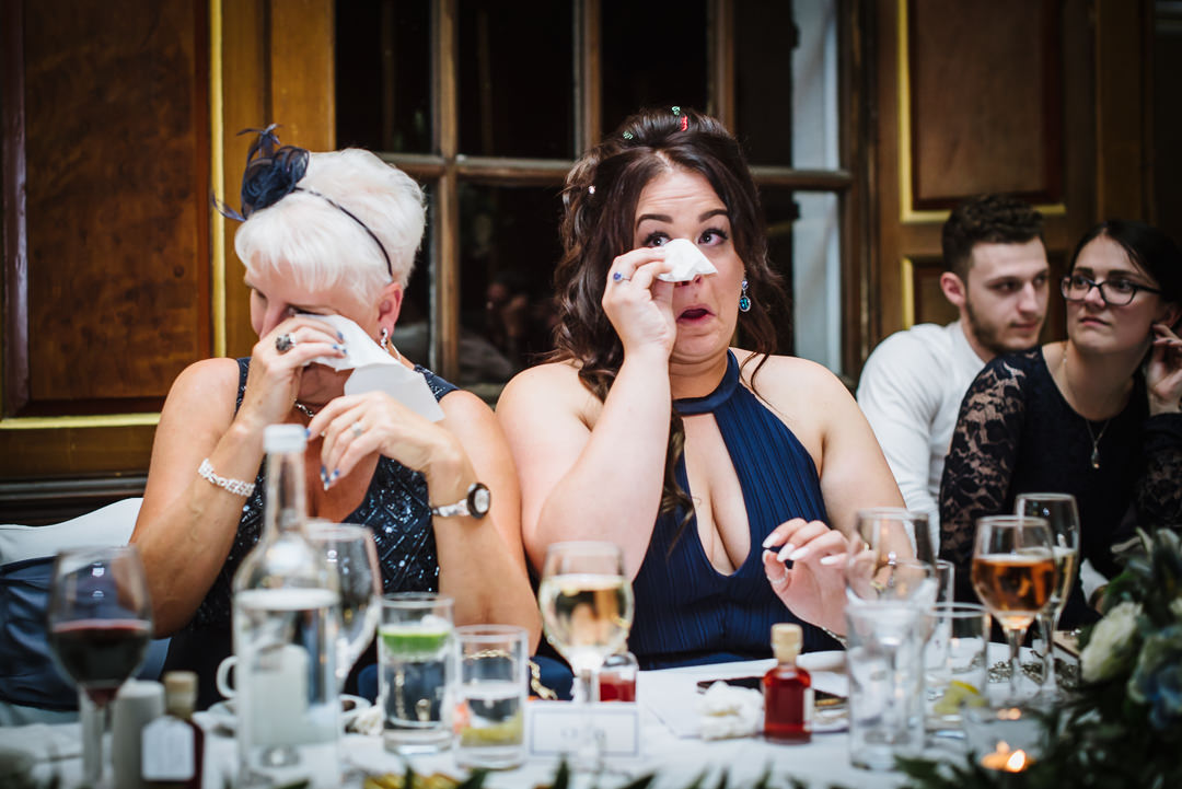 Guests cry during the wedding speeches.