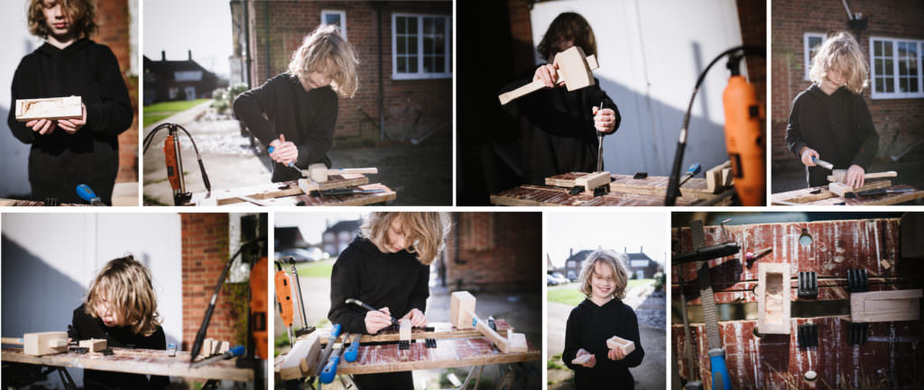 boy makes a wooden box with his new tools, captured by welwyn garden city photographer