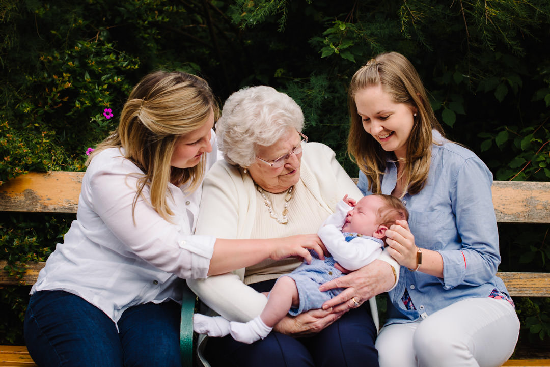 Relaxed family photography St Albans with great grand mother, two grandchildren and the new baby.