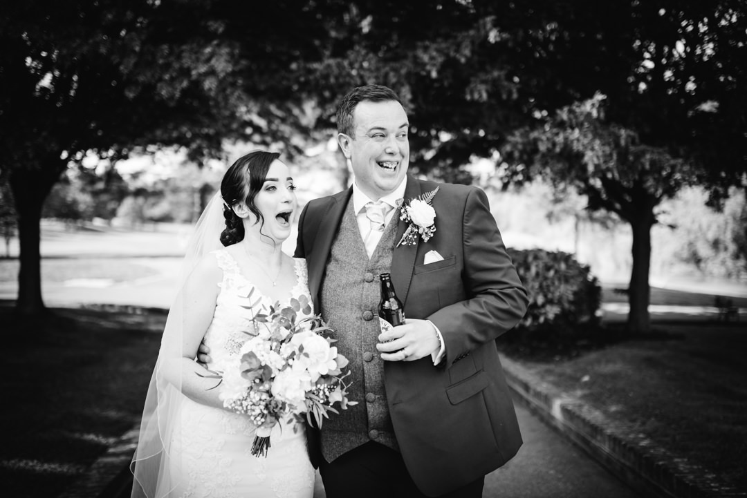 bride and groom sharing a joke at their wedding at essendon country club