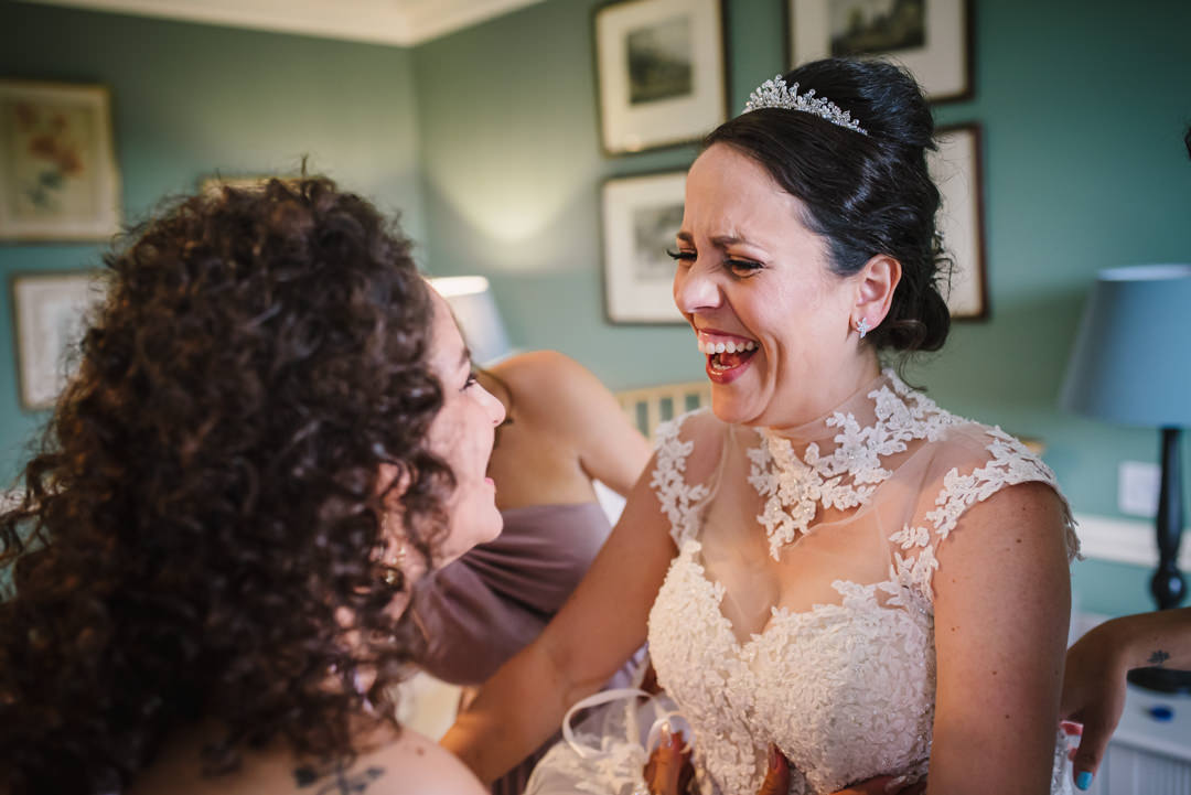 bridal prep jokes between sisters at hatfield house wedding