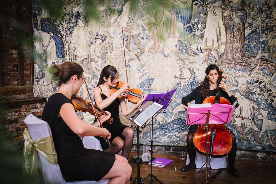 string quartet play to guests in hatfield house the old palace