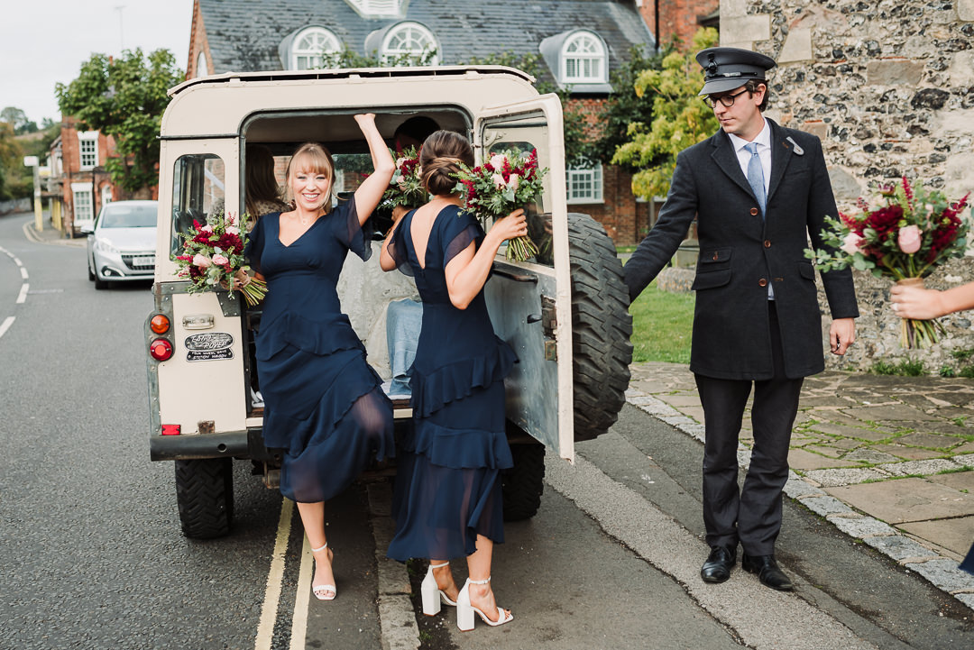 bridesmaids arriving in style at the church for the wedding ceremony
