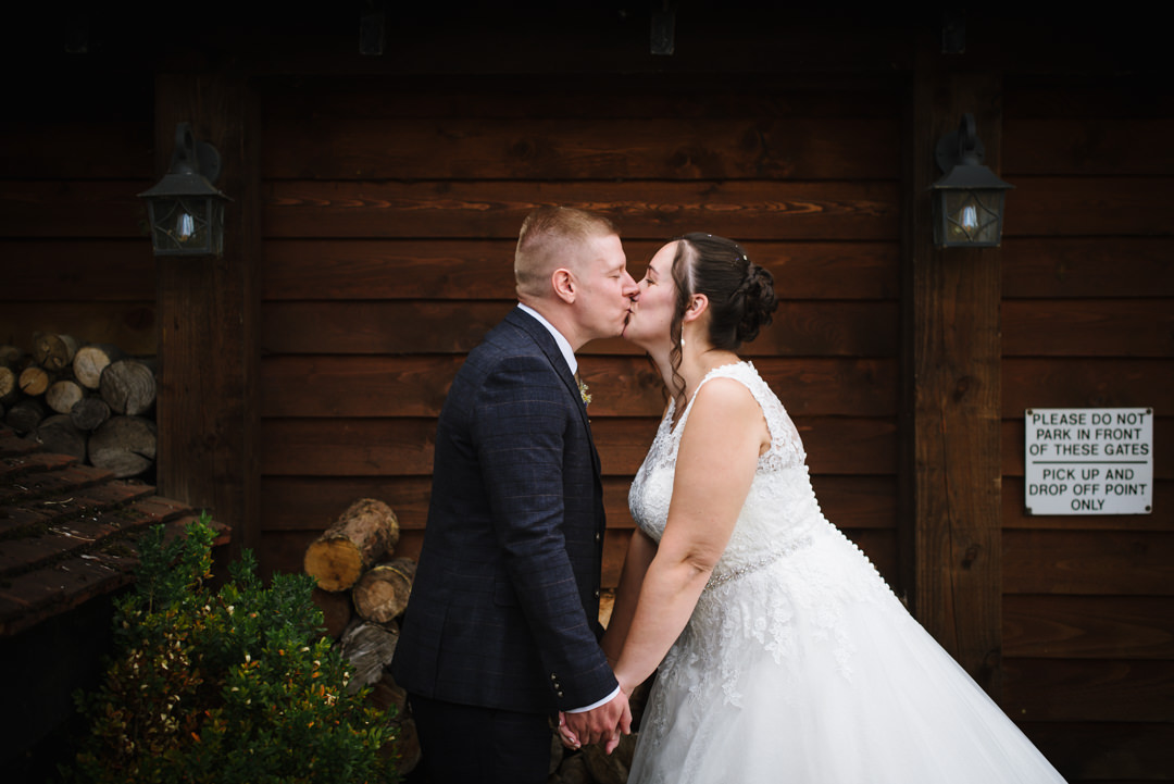 first kiss by bride and groom captured by hertfordshire wedding photographer