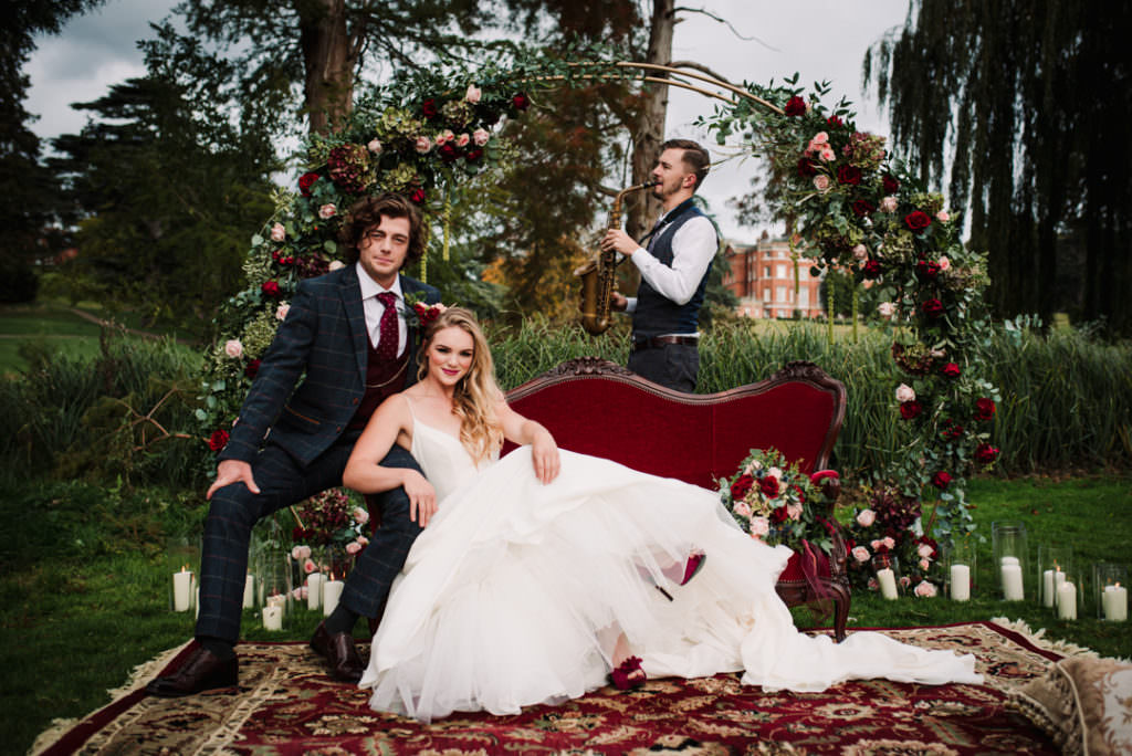 bride and groom take time out from their brocket hall wedding