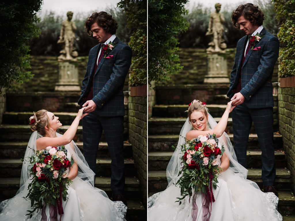 groom holds his brides hand tenderly during their hertfordshire wedding photography session