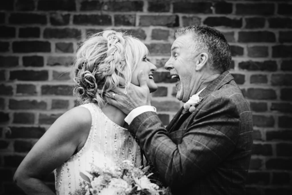 Favourite Photos Hertfordshire Wedding Photographer captures funny moment between bride and groom. It's one of their favourite photos