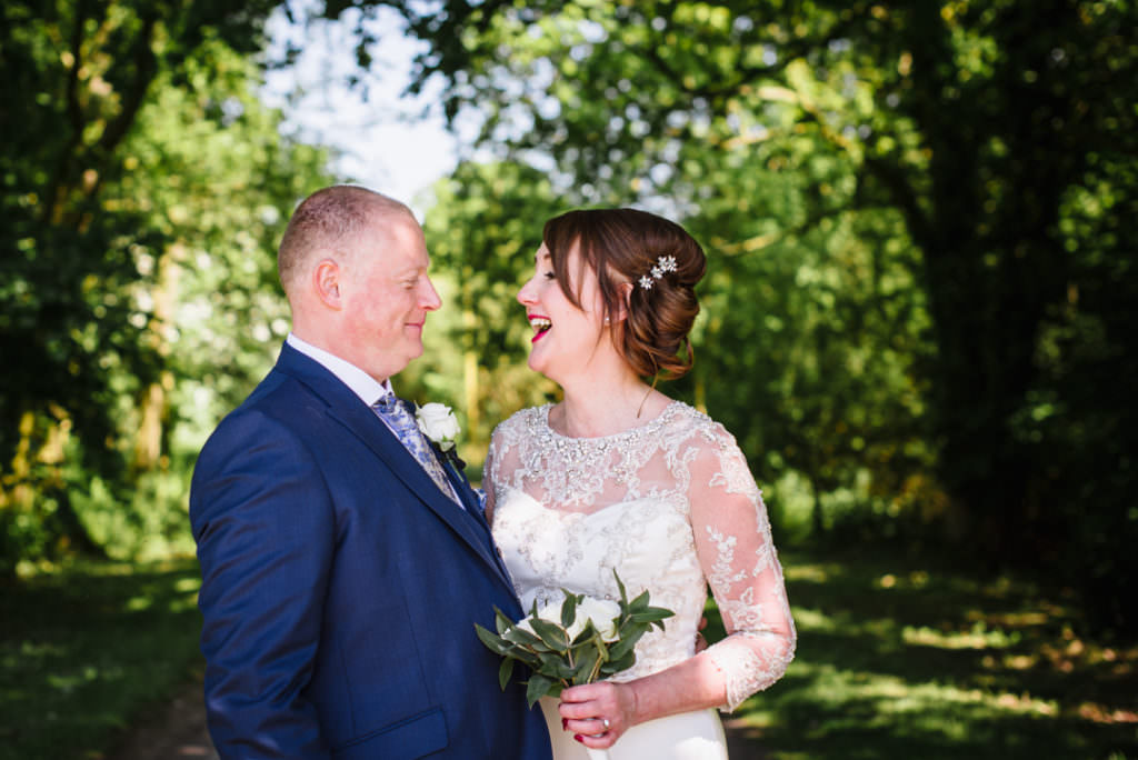  Hertfordshire Wedding Photographer captures newly weds laughing