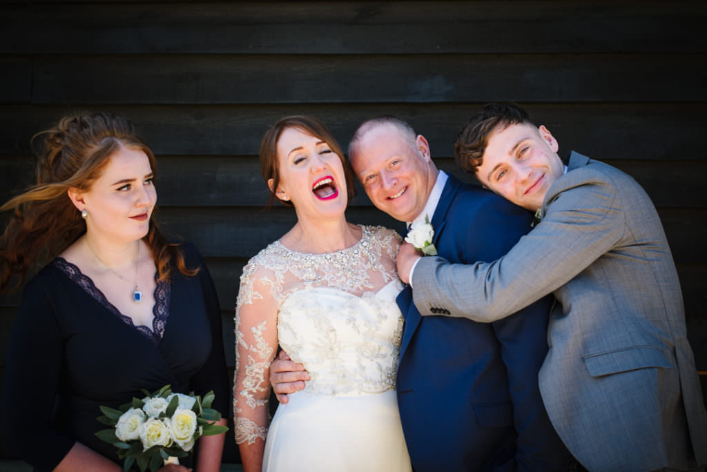 Favourite Photos of bride and groom and their kids taken at their Hertfordshire Wedding 