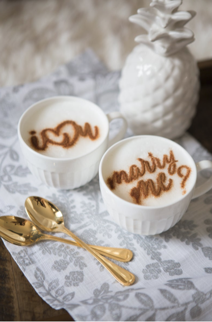 Marry me proposal stencil in coffee froth