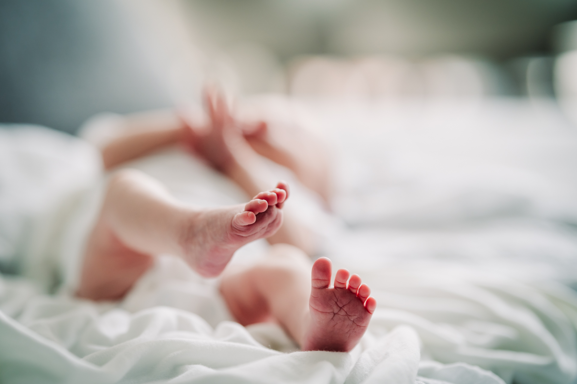 Newborn toes in natural light in Hertfordshire home