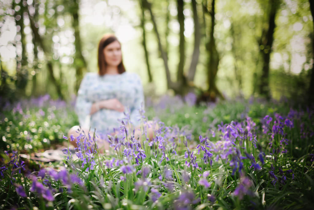 bluebells create the perfect backdrop for a hertfordshire maternity photoshoot