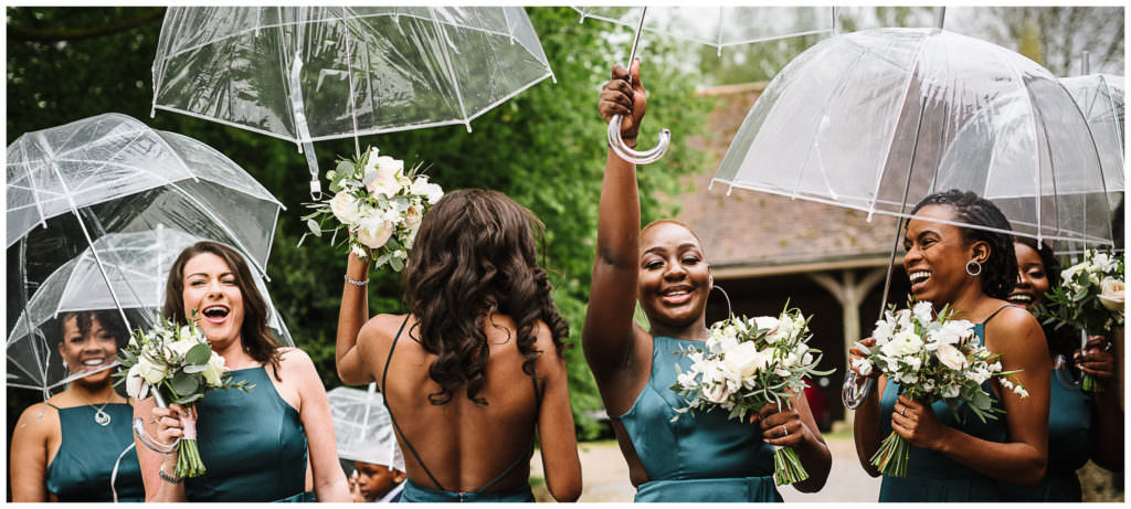 summer wedding planning advice, take umbrellas along just in case
