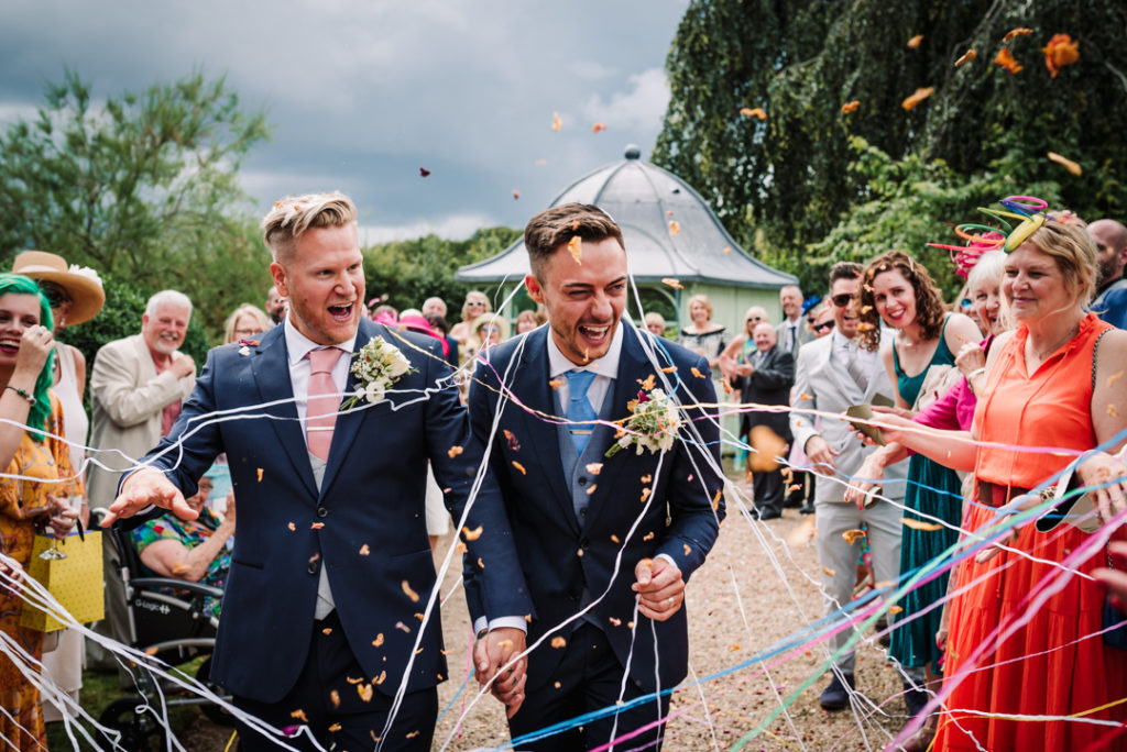 Hertfordshire same sex wedding ceremony ends with confetti and crazy string throw