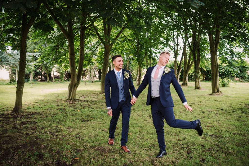 groom and groom spend some time together before their same sex hertfordshire wedding