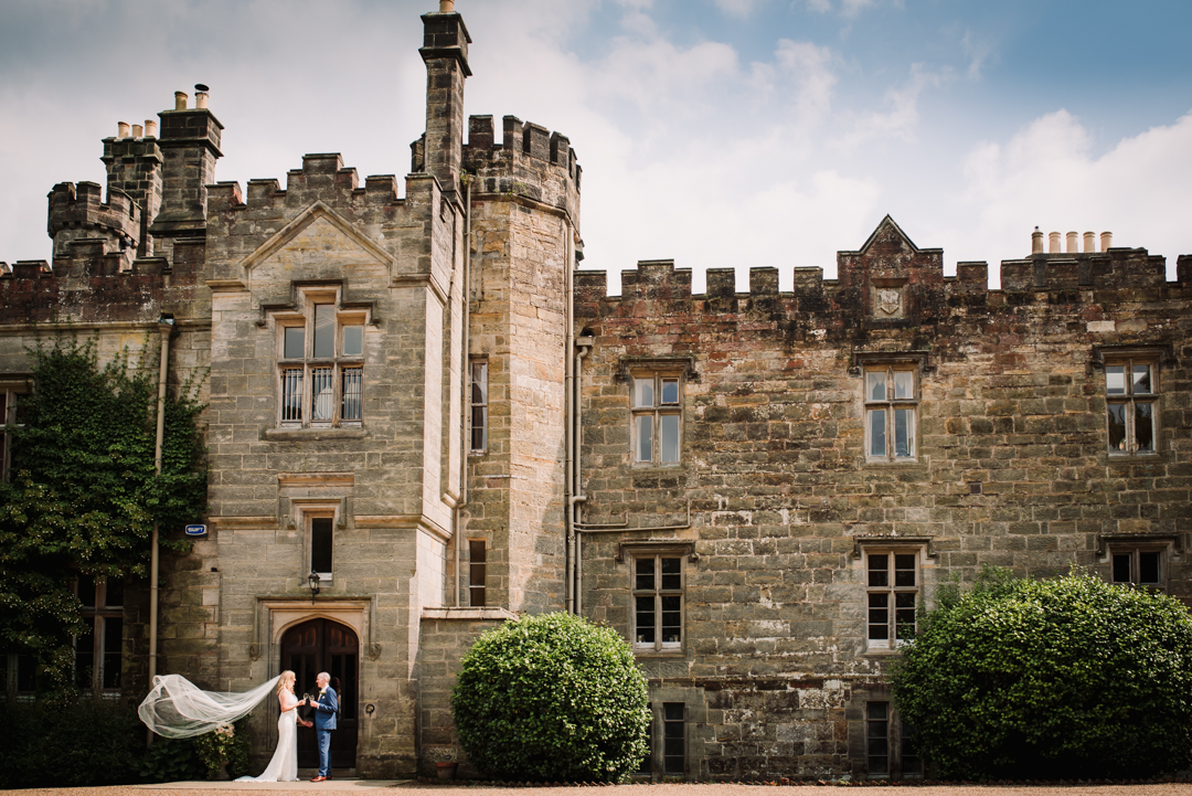 Wadhurst Castle Wedding Photography set against the back drop of the main doors
