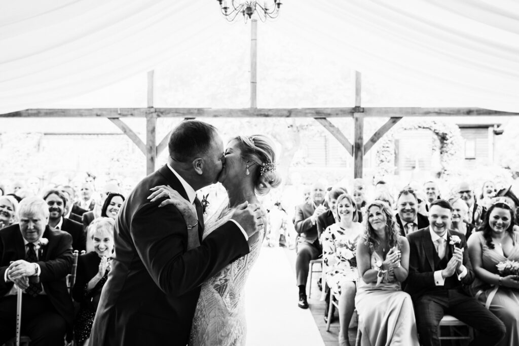 bride and grooms first kiss at Coltsfoot Country Retreat