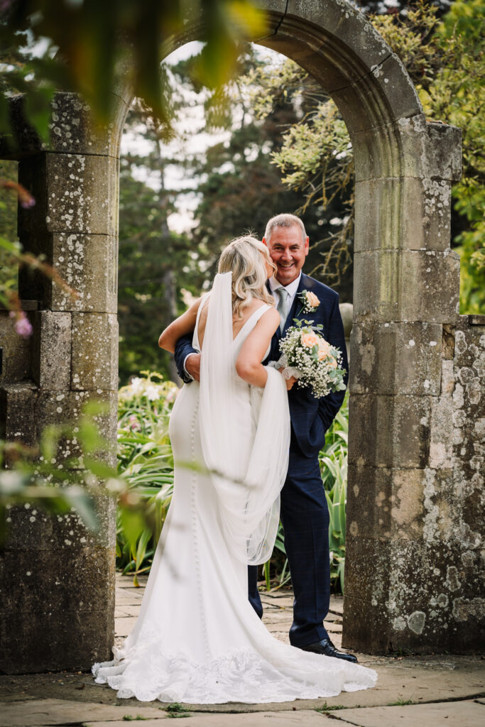 Fanhams Hall wedding photographer captures romantic moment between bride and groom