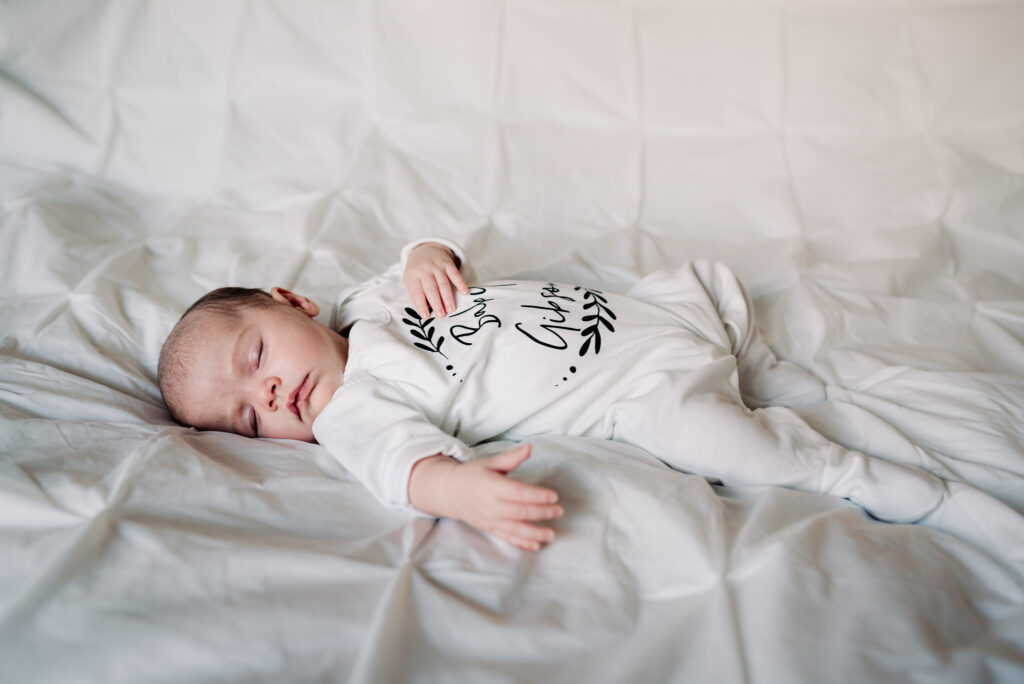 Photographer captures sleeping newborn