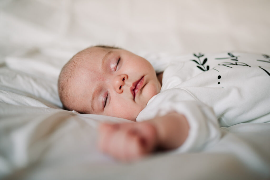 Newborn sleeps as Hertfordshire baby photographer captures the moment