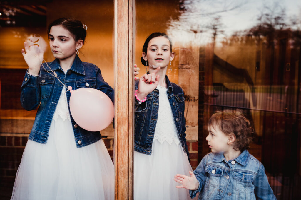 Hertfordshire photographer captures young bridesmaids playing