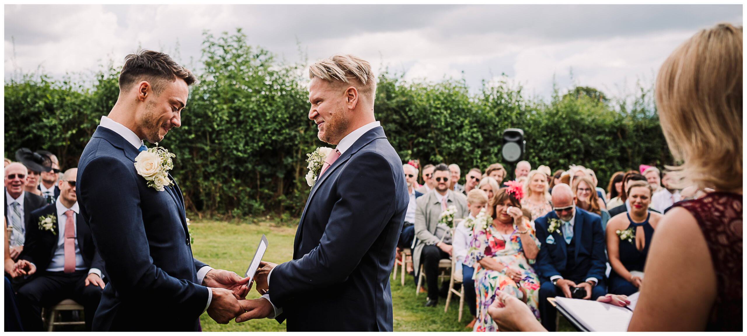 outdoor wedding ceremony photographed in the sunshine in Hertfordshire
