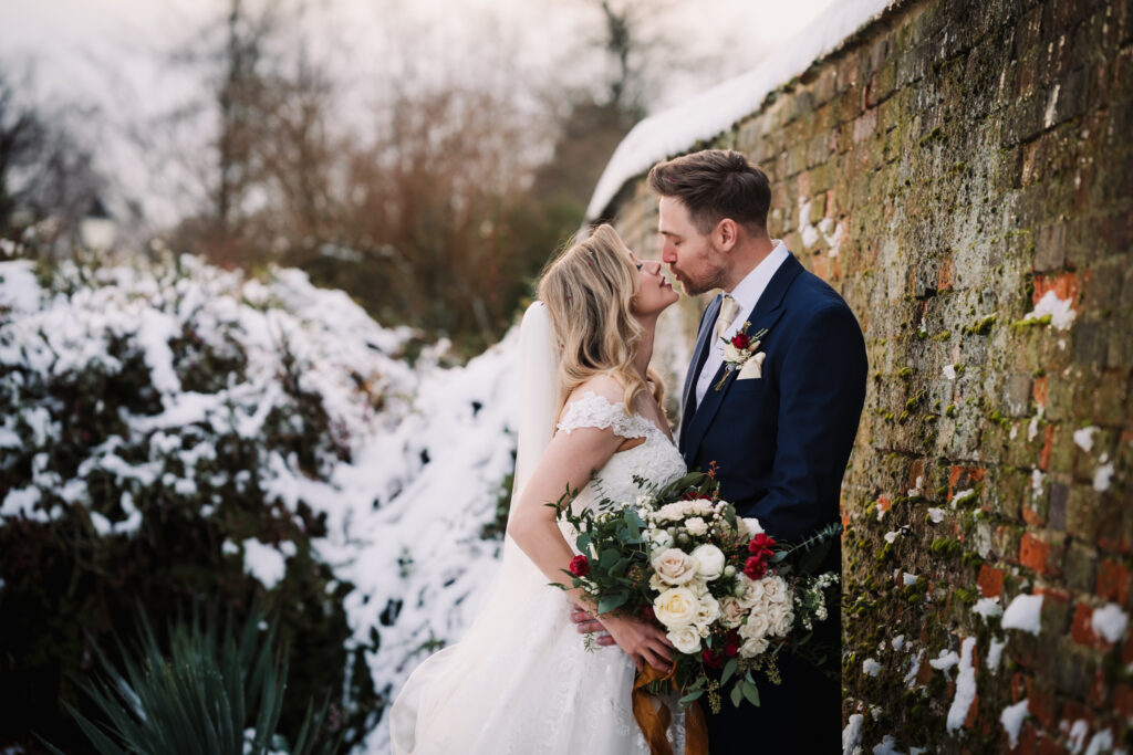 snowy scenes at Offley Place winter wedding