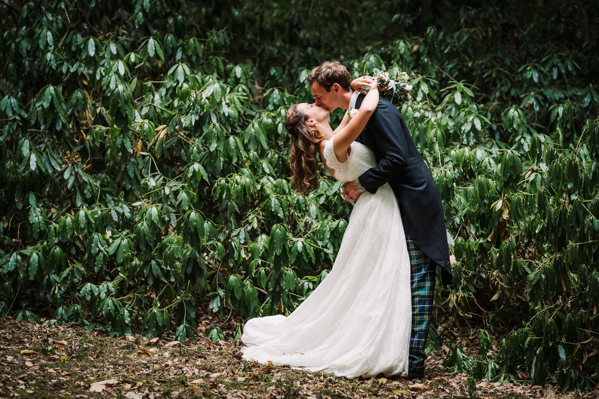 Woodland setting for bride and grooms first kiss after their wedding ceremony in hertfordshire