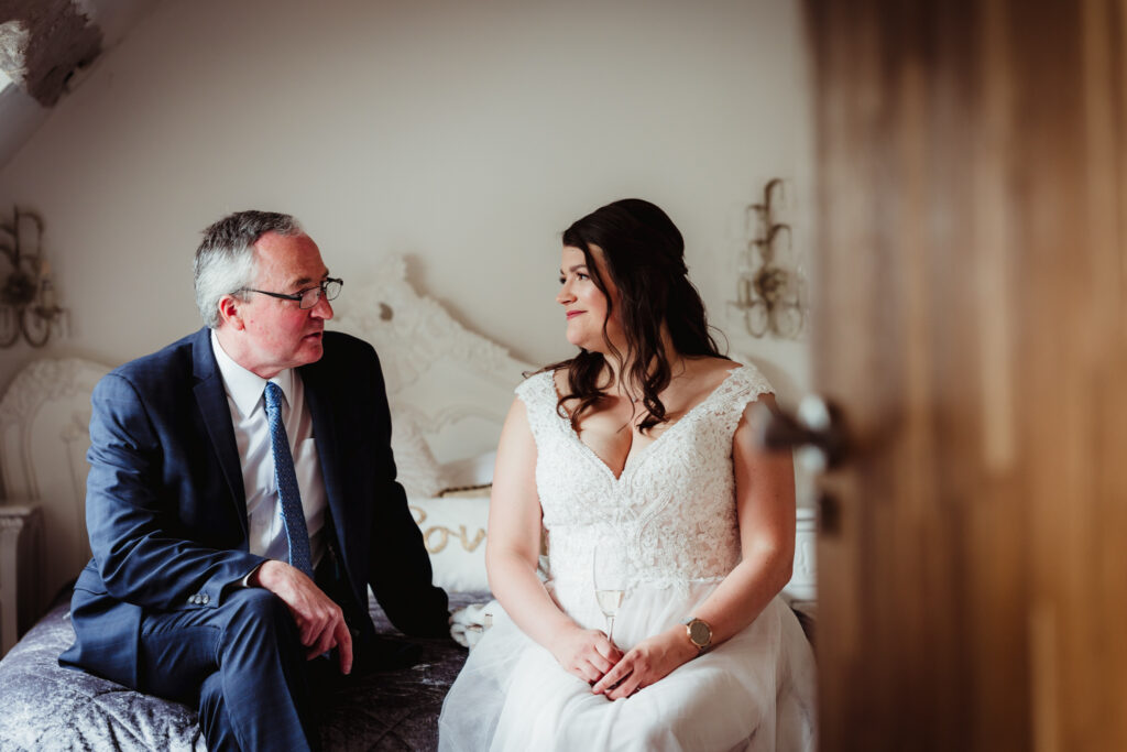 Father of the bride spends a few moments with his daughter before her sheene mill wedding